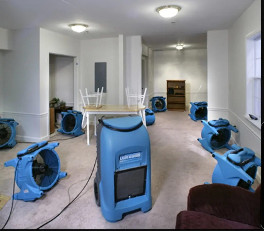 Air movers and dehumidifier setup for Water Extraction & Removal in Warrington
